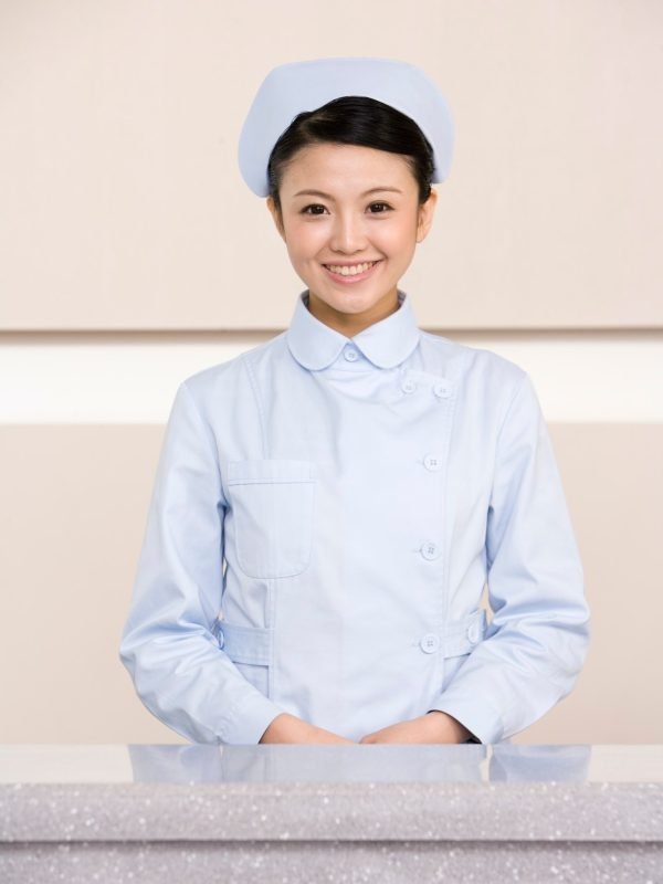 young-nurse-poised-at-nurses-station.jpg